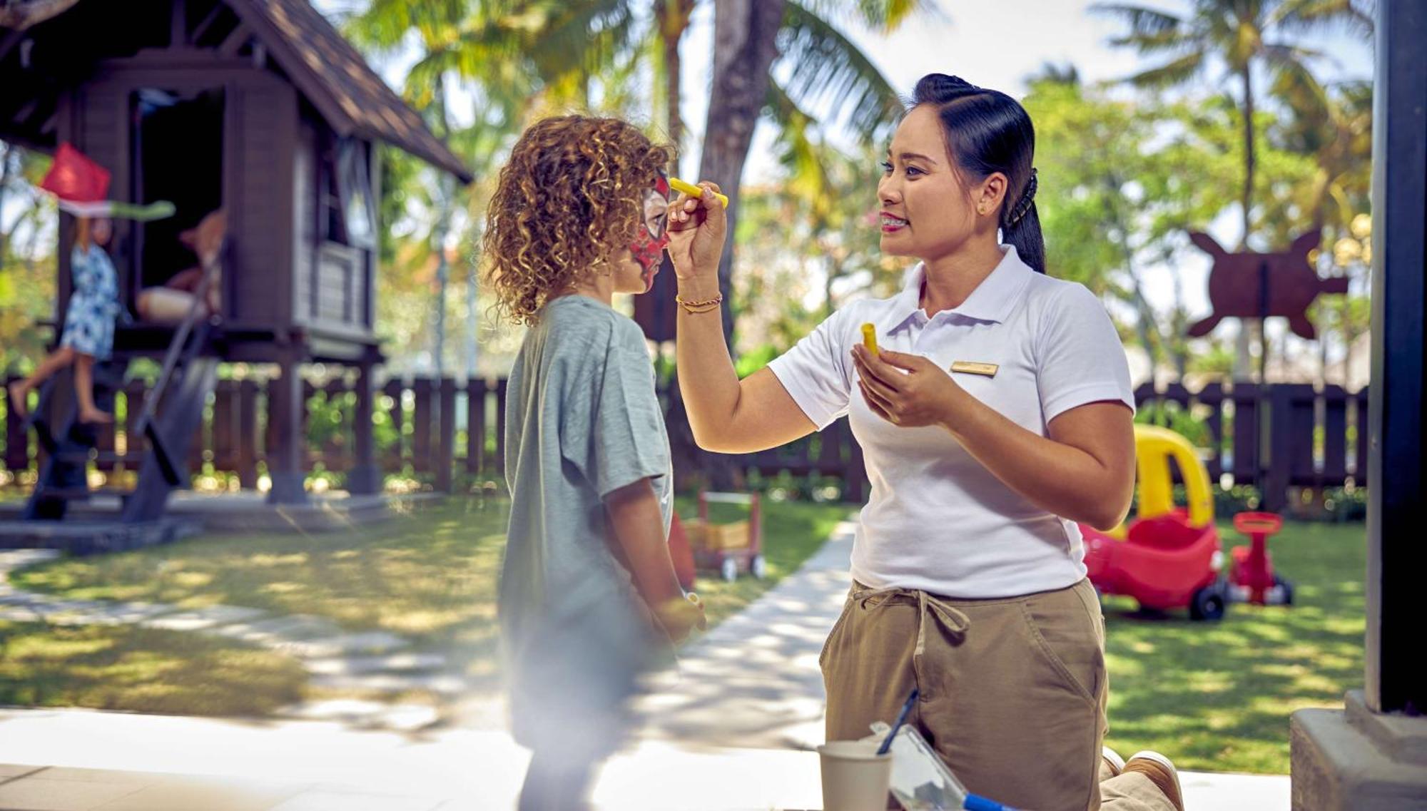 Hotel Conrad Bali Nusa Dua  Exterior foto A child with cystic fibrosis receives a nebulizer treatment.